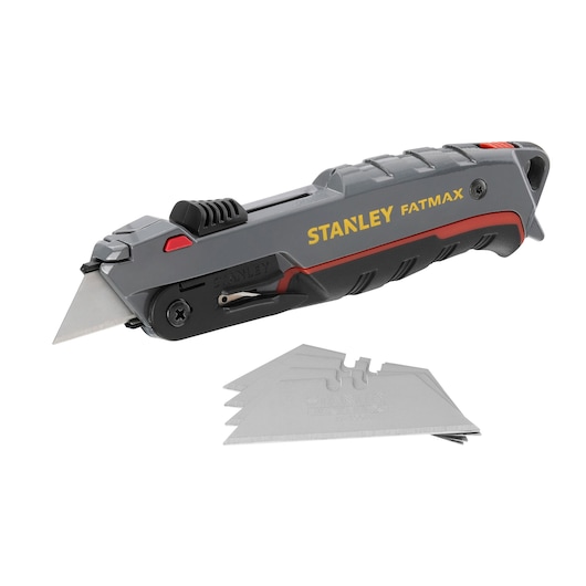 STANLEY 0-10-242 utility knife with gray and black body, yellow logo, and extra blades, side angle on white background.