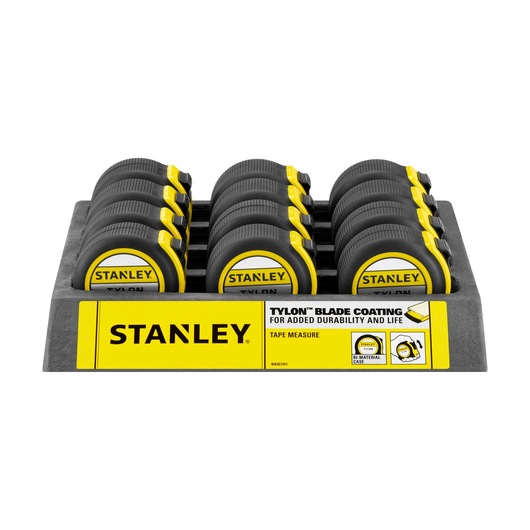 Photo of STANLEY 1-30-657 tape measures in yellow and black display tray, front angle.