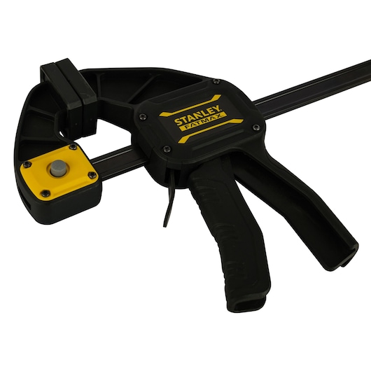 Stanley FMHT0-83235 FatMax trigger clamp in black and yellow, side angle on white background.