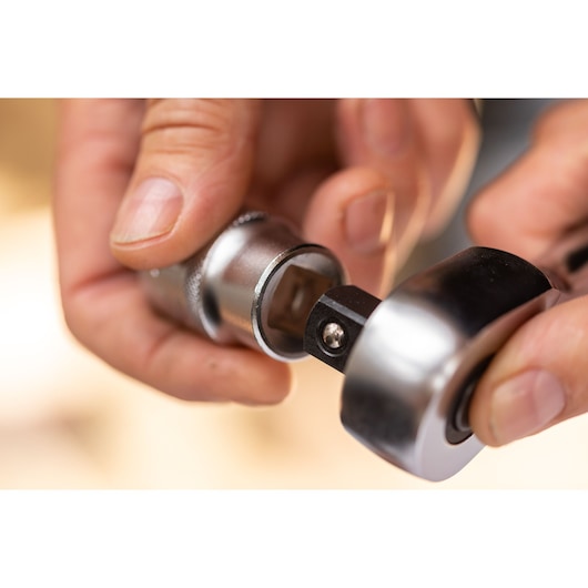 STANLEY FMMT17239-0 ratchet being attached to socket, close-up photography, silver metal finish.
