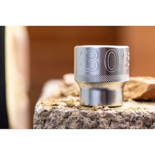 Photo of STANLEY FMMT17242-0 chrome socket, size 30mm, shown on a rough surface.