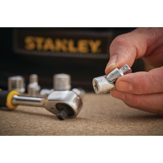 STANLEY FMMT18008-0 socket accessory photography showing close-up detail and hand holding tool.