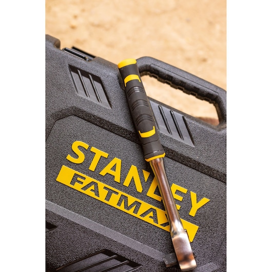 Photo of STANLEY FMMT82827-1 tool case with a black and yellow handled tool resting on top.