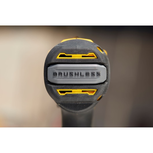Front close-up of STANLEY SFMCD715D2F brushless power tool handle with yellow accents, photography.