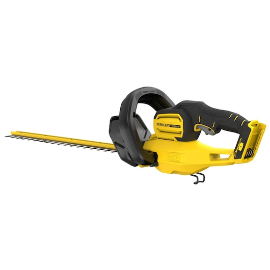 Photo of STANLEY SFMCHT650B yellow and black cordless hedge trimmer, side angle, with ergonomic handle and blade guard.