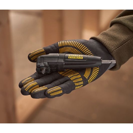 STANLEY STA88582 FatMax right angle screwdriver held in gloved hand, close-up photography.