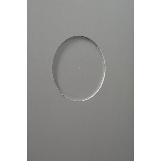 STANLEY STHT1-05878 plasterboard with a clean circular cutout, top view, showing precise cut edges.