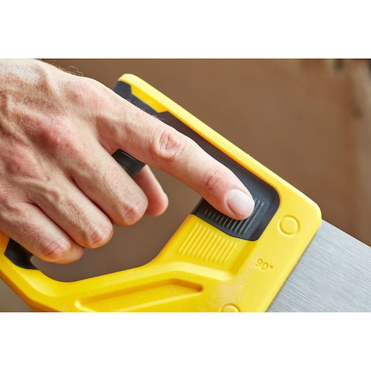 STANLEY STHT20354-1 hand saw handle close-up in yellow and black, highlighting ergonomic grip and adjustment.