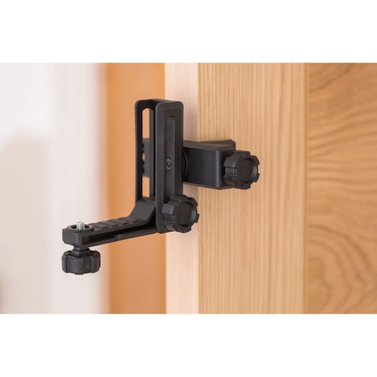 STANLEY STHT77498-1 photography door clamp mount with adjustable knobs on close-up view.