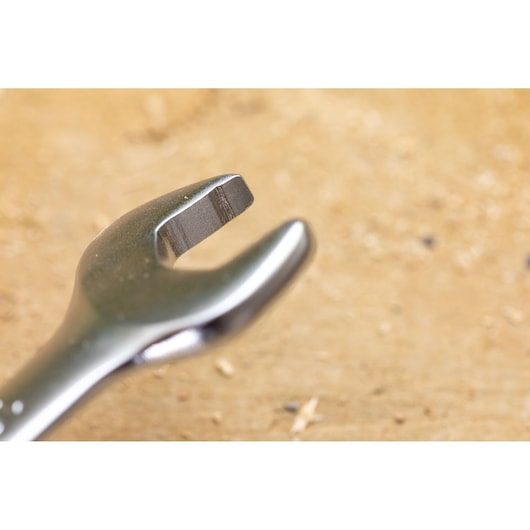 STANLEY STMT82847-0 open-end wrench close-up on wooden surface, silver finish, tool photography.