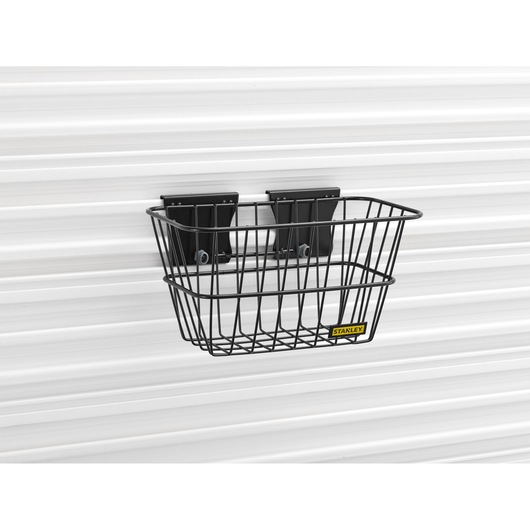 STANLEY STST82603-1 wire storage basket mounted on white wall, front angle.
