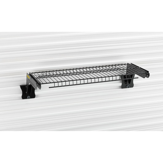 STANLEY STST82613-1 metal wire wall shelf, photo from side angle, mounted on white grooved wall.