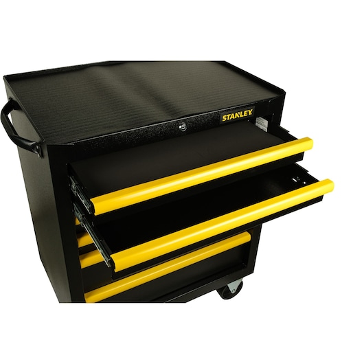 STANLEY STST98182-1 tool chest with open yellow-handled drawers, angled view, black metal body.